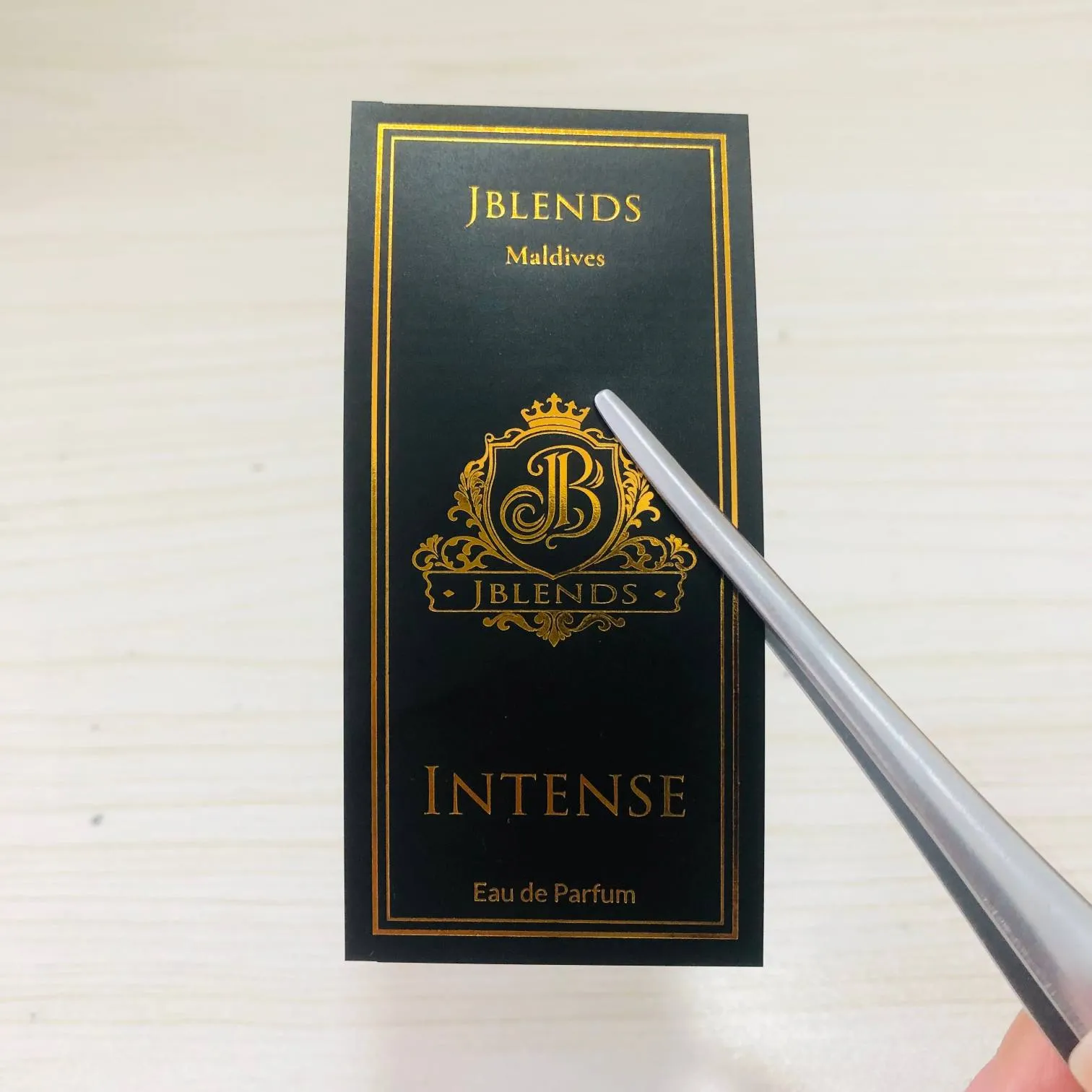 Etiqueta de perfume estampada en caliente